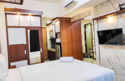Panakkukang Apartment | Homey and Comfy Studio at Vida View Makasar Apartment By Travelio