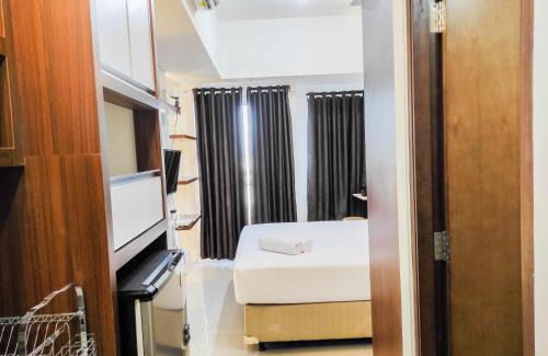 Panakkukang Apartment | Homey and Comfy Studio at Vida View Makasar Apartment By Travelio