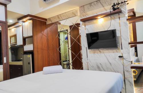 Panakkukang Apartment | Homey and Comfy Studio at Vida View Makasar Apartment By Travelio