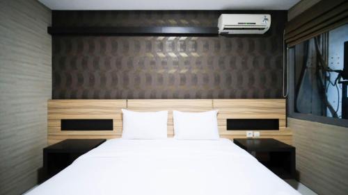 Surabaya Apartment | Homey and Cozy Living 2BR Apartment at Aryaduta Residence Surabaya By Travelio