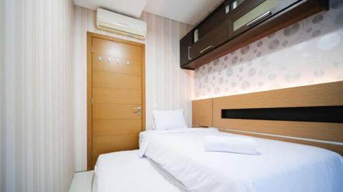 Surabaya Apartment | Homey and Cozy Living 2BR Apartment at Aryaduta Residence Surabaya By Travelio