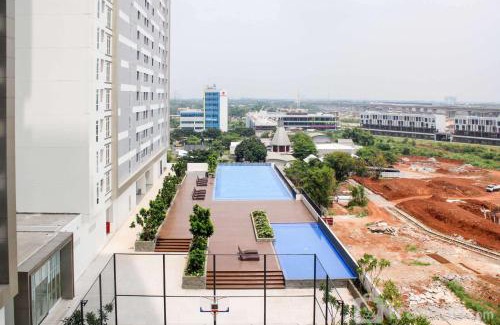 Cikarang Apartment | Homey and Minimalist Studio at Vasanta Innopark Apartment By Travelio