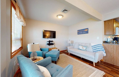 The Bays House | Homey lakeside property w/one house, two cottages, mtn. views, & private beach