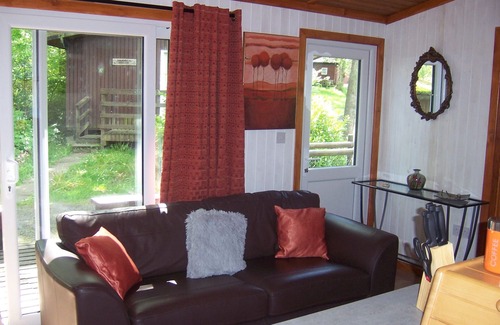Cenarth Ski Chalet | Honeysuckle Lodge set in a Beautiful 24 acre Woodland Holiday Park