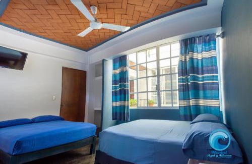 Crucecita House | Hostal Azul y Blanco