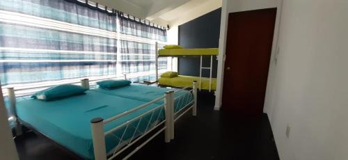 Crucecita House | Hostal Azul y Blanco