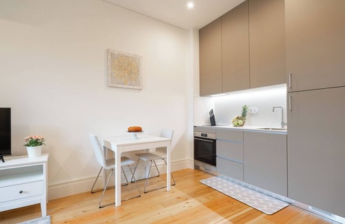 Guimaraes Apartment | HostWise - Bright Flat w/Balcony