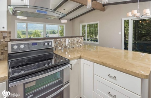 Northeast Anchorage House | Hot Tub, Rain Room shower with Mountiain views of Ski Slopes nestled in nature.