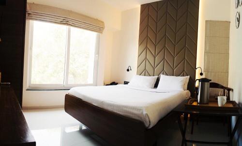 Koregaon Park Hotel | Hotel Cozy Inn