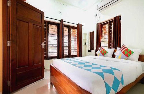 North Paravur Hotel | Hotel O ATHARVAM RESORT