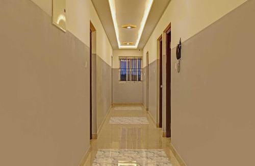 Krishnarajapura Hotel | Hotel O Sri Sapthagiri Comforts