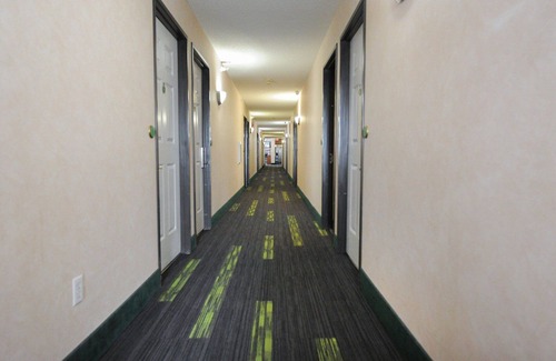 Yuma Hotel | Hotel room with ONE QUEEN BED and attached, private bathroom.