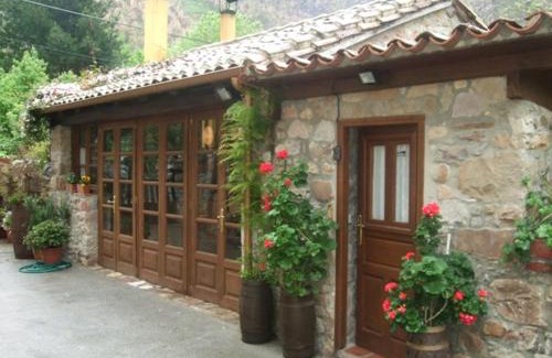 Nueva House | Hotel rural La Llastra