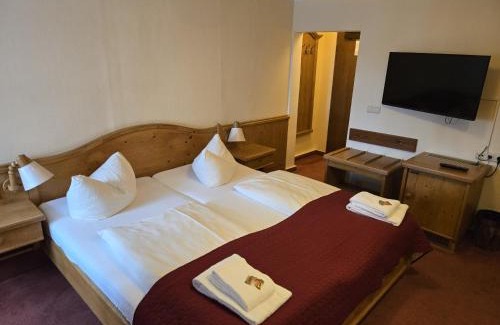 Quedlinburg Bed & Breakfast | Hotel Zur Goldenen Sonne