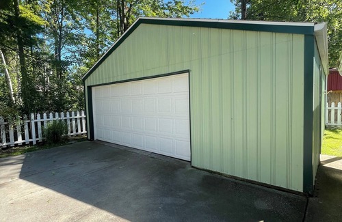 Prudenville Cabin | Houghton Lake cabin with garage game room lounge. No cleaning fees.
