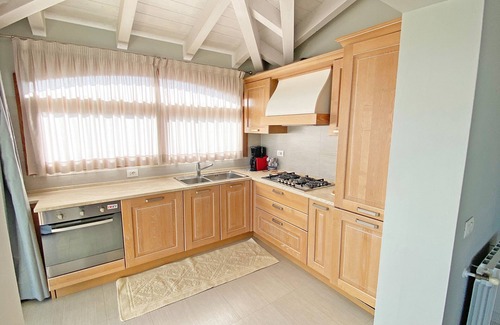 Budoni Apartment | House 41 - penthouse in the historic center crazy sea view - all services nearby