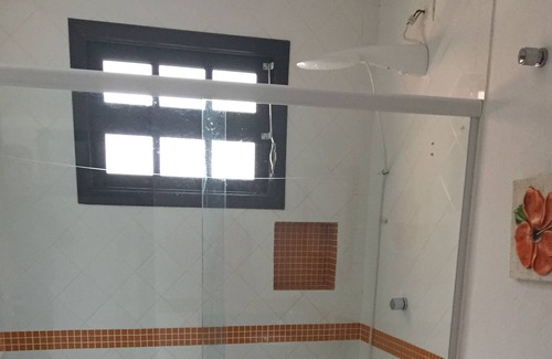 Barra do Una House | House in Condominium in the Atlantic Forest. Pool / Barbecue / Maid / Wi-fi
