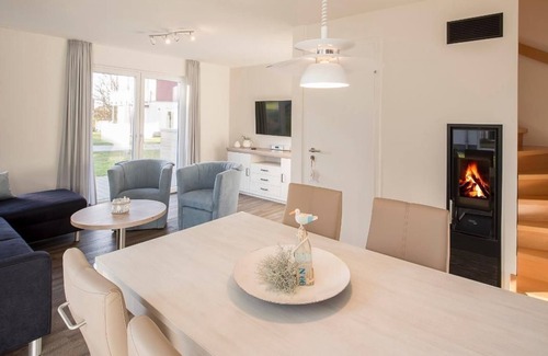 Schillig House | House no. 06, Ferienhaus Deichgraf - Modern vacation home, sauna, south-facing terrace,