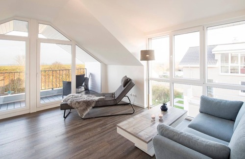 Schillig House | House no. 06, Ferienhaus Deichgraf - Modern vacation home, sauna, south-facing terrace,