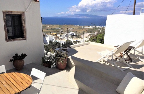 Finikia House | House of the Seven Ships. Cycladic traditional house with sea and sunset view