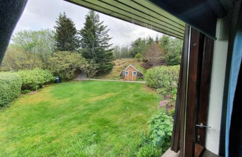 Hornafjörður House | House with a magical garden and sunroom