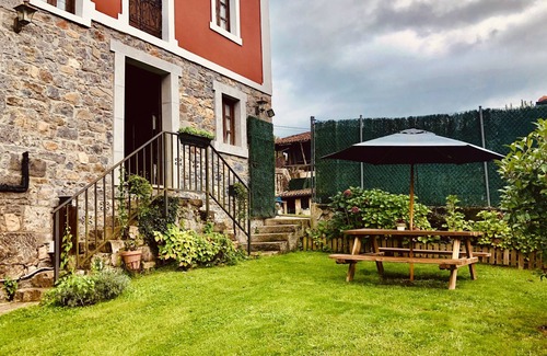 Cangas de Onis Cottage | House with garden and barbecue in the heart of Cangas de Onis, pets allowed.