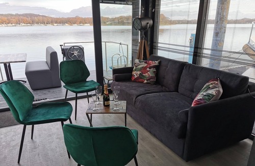 Municipality of Mook en Middelaar Boat Rental | Houseboat Mookerplas with Sauna & Lake View