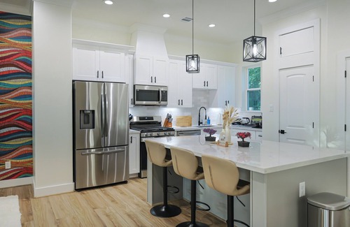 Greater Heights House | Houston Heights Rooftop Oasis | Game Room and More
