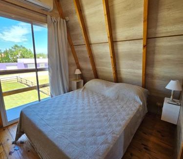 Claromeco House | Huellas en la arena
