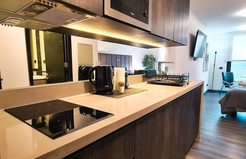 Downtown Santiago Condo | Huerfanos Spot by Andes+