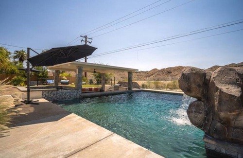 Cathedral City Cove House | Huge Home: Pool, Grotto, Water Slide, Swim Up Bar, Hot Tub, Fire Pit, Game Room