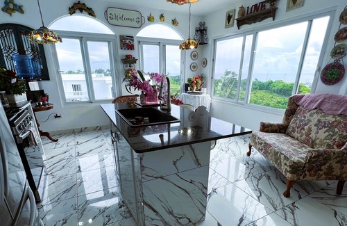 Cabrera Apartment | Huge penthouse suite w/kitchen, sunroom, & soaking tub on a private balcony!