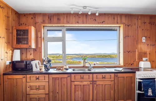 Claddaghduff Ski Chalet | Hughs Cottage Sea Lake Views to Steal Your Heart