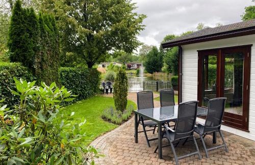 Kootwijk Ski Chalet | Huize Bosrijk aan het water