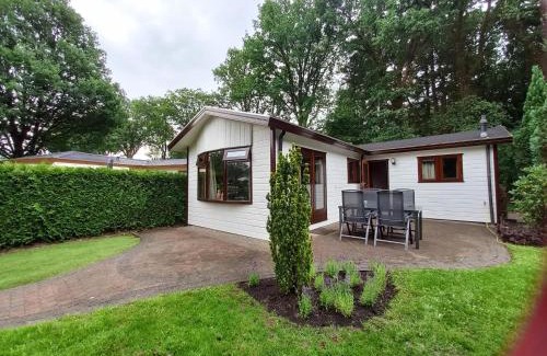 Kootwijk Ski Chalet | Huize Bosrijk aan het water