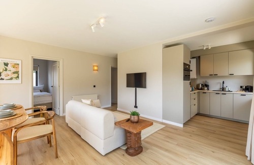 Cadzand-Bad Apartment | Huswell - Charming Apartment with Garden & Parking