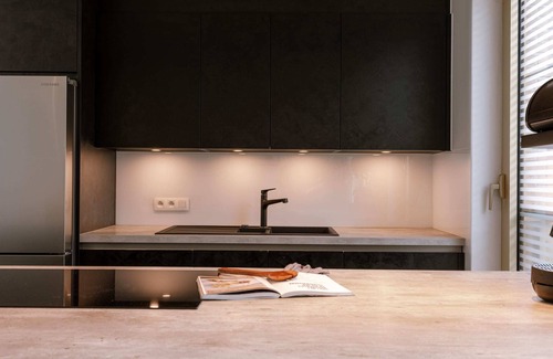 Den Dam Apartment | Huswell - Modern apartment with large terrace