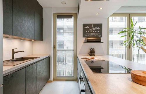 Den Dam Apartment | Huswell - Modern apartment with large terrace