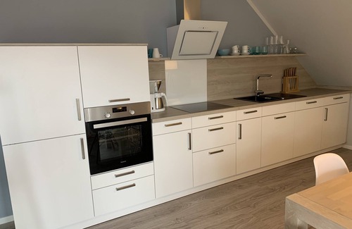Westeraccumersiel Apartment | Huus Achterdiek - Moderne Oberwohnung "oberdeck"