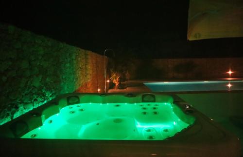 Ggantija Apartment | Hygge Holiday Home with Large Communal Pool and Private Hot Tub