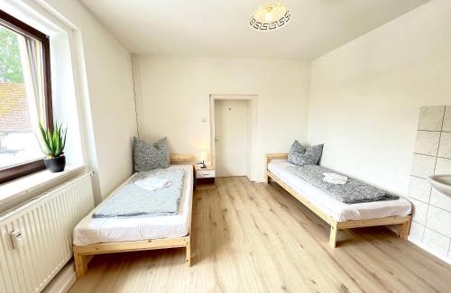 Pilsting Apartment | I Apartment 14 Personen - Monteurzimmer - Ferienwohnung, Großköllnbach I