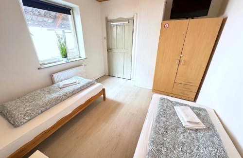Pilsting Apartment | I Apartment 17 Personen - Monteurzimmer - Ferienwohnung, Großköllnbach