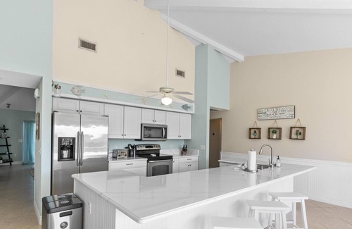 Marco Island House | I'm coco-nuts for you! Two story home waterfront home w/pool and bbq