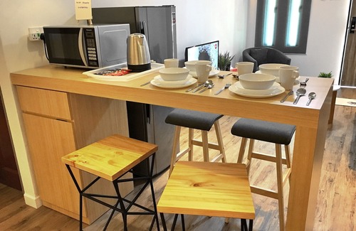 Downtown George Town House | iBook4 Deluxe 2 Bedroom Gurney Suite by iBook Homestay