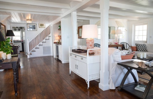 Dunmore Town House | Iconic Waterfront Cottage with Sunset Porch