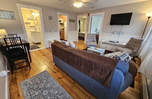 Commercial Street Condo | Ideal 2BR Condo – Steps to Beach & Downtown, Waterfront Deck, Parking Included
