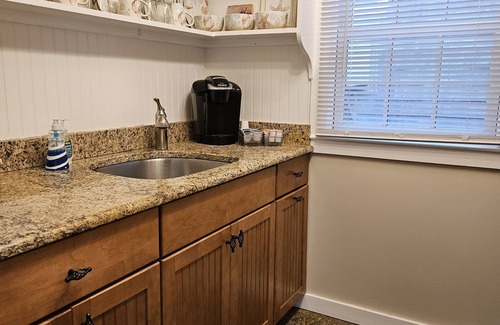 Commercial Street Condo | Ideal 2BR Condo – Steps to Beach & Downtown, Waterfront Deck, Parking Included