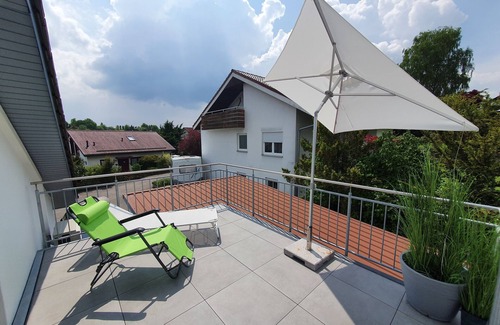 Bermatingen Apartment | Idyllic modern apartment with two balconies and air conditioning