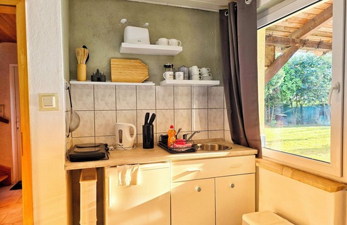 Falkenberg House | Idyllic vacation apartment with beach house character & view of the countryside