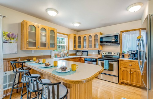 Camano Island House | Idyllic woodsy retreat with firepit, two kitchens, Port Susan views & woodstoves